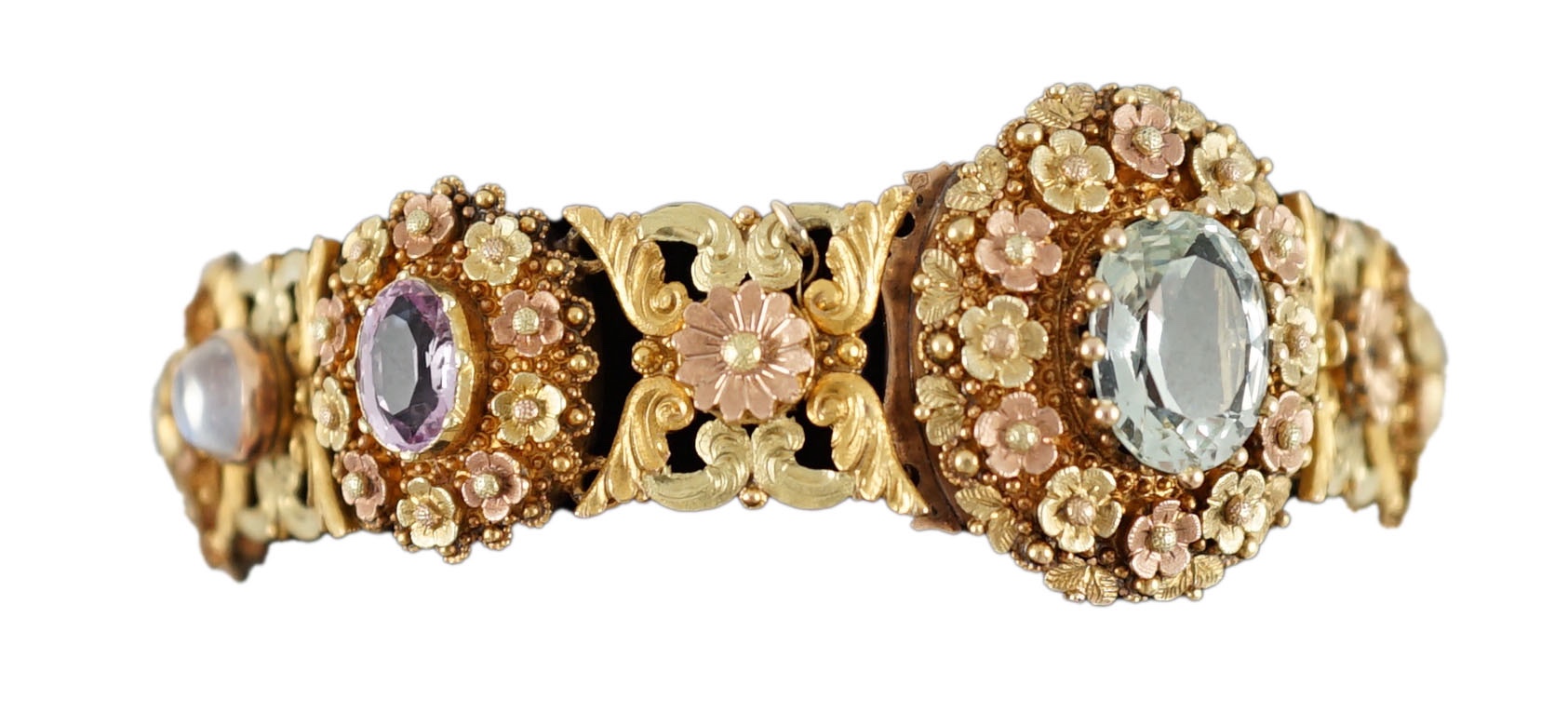 A 19th century pierced three colour gold, pink topaz, moonstone, citrine and aquamarine set bracelet.